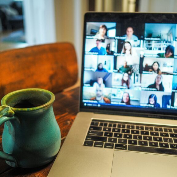 macbook pro displaying group of people