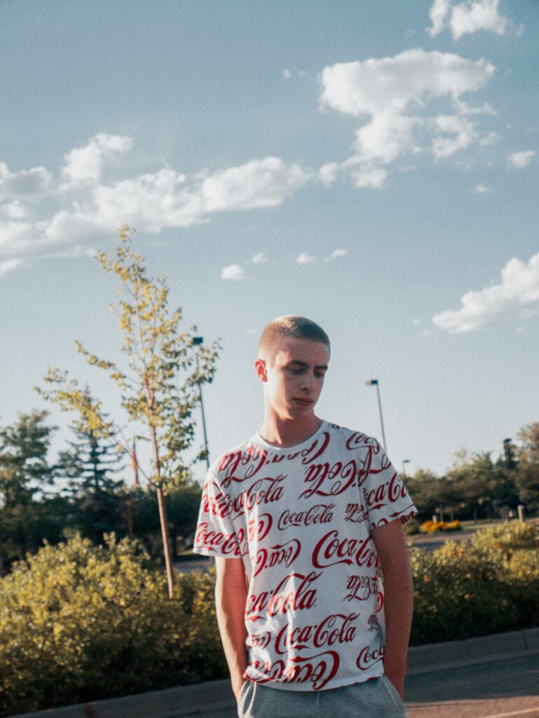 Man wearing a branded t-shirt