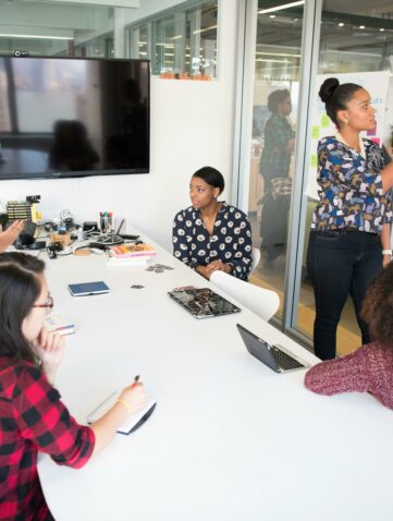 employees discussing a business promotion strategy